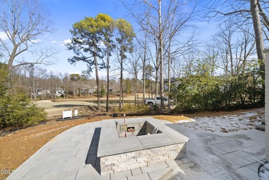 Stunning luxury home and pool house on NRCC 9th Fairway of the on North Ridge Country Club in North Carolina - for sale on GolfHomes.com, golf home, golf lot