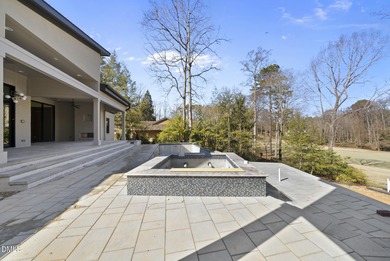 Stunning luxury home and pool house on NRCC 9th Fairway of the on North Ridge Country Club in North Carolina - for sale on GolfHomes.com, golf home, golf lot