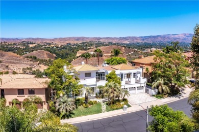 Contemporary Glamour & Unique Accents Meet in this Vista Pointe on Calabasas Golf and Country Club in California - for sale on GolfHomes.com, golf home, golf lot