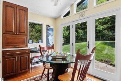 Beautiful view of Crystal Lake from this updated 4 BR home on Crystal Lake Golf Club in Michigan - for sale on GolfHomes.com, golf home, golf lot