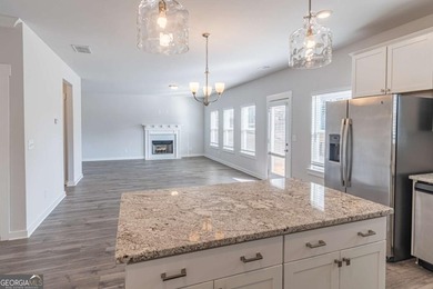 Welcome home to this stunning residence nestled in the desirable on Traditions of Braselton Golf Club in Georgia - for sale on GolfHomes.com, golf home, golf lot