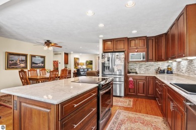 Beautiful view of Crystal Lake from this updated 4 BR home on Crystal Lake Golf Club in Michigan - for sale on GolfHomes.com, golf home, golf lot