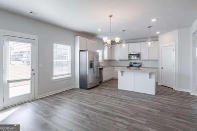 Welcome home to this stunning residence nestled in the desirable on Traditions of Braselton Golf Club in Georgia - for sale on GolfHomes.com, golf home, golf lot