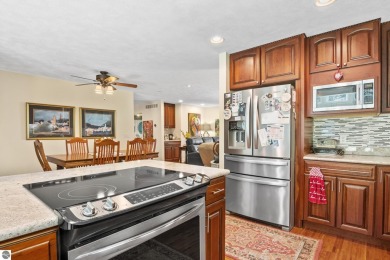 Beautiful view of Crystal Lake from this updated 4 BR home on Crystal Lake Golf Club in Michigan - for sale on GolfHomes.com, golf home, golf lot
