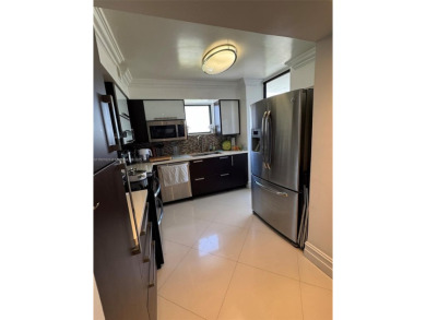 Spectacular water views from Every room in this 2 bed/2 bath on Turnberry Isle Resort and Club in Florida - for sale on GolfHomes.com, golf home, golf lot
