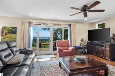 Beautiful view of Crystal Lake from this updated 4 BR home on Crystal Lake Golf Club in Michigan - for sale on GolfHomes.com, golf home, golf lot