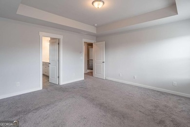 Welcome home to this stunning residence nestled in the desirable on Traditions of Braselton Golf Club in Georgia - for sale on GolfHomes.com, golf home, golf lot