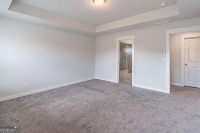 Welcome home to this stunning residence nestled in the desirable on Traditions of Braselton Golf Club in Georgia - for sale on GolfHomes.com, golf home, golf lot