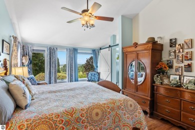 Beautiful view of Crystal Lake from this updated 4 BR home on Crystal Lake Golf Club in Michigan - for sale on GolfHomes.com, golf home, golf lot