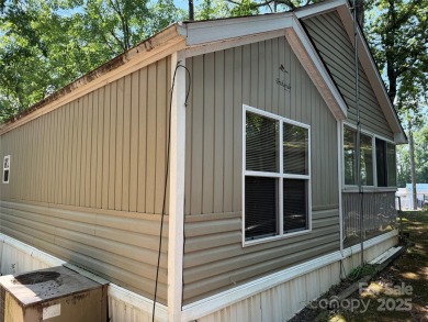 Are you looking for a Park Model and plenty of land as well. For on The Tillery Tradition Country Club in North Carolina - for sale on GolfHomes.com, golf home, golf lot