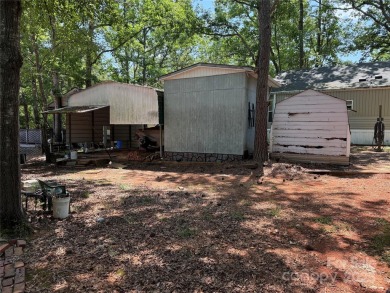 Are you looking for a Park Model and plenty of land as well. For on The Tillery Tradition Country Club in North Carolina - for sale on GolfHomes.com, golf home, golf lot