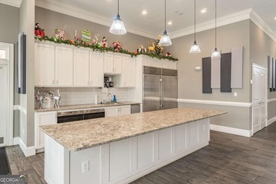 Welcome home to this stunning residence nestled in the desirable on Traditions of Braselton Golf Club in Georgia - for sale on GolfHomes.com, golf home, golf lot