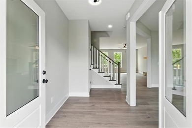 Welcome Home to 29 Creekview Drive! This stunning Alexander on The Plantation Golf Club in Georgia - for sale on GolfHomes.com, golf home, golf lot