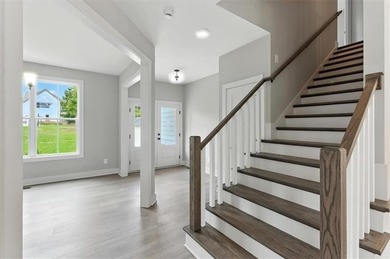 Welcome Home to 29 Creekview Drive! This stunning Alexander on The Plantation Golf Club in Georgia - for sale on GolfHomes.com, golf home, golf lot