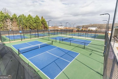 Welcome home to this stunning residence nestled in the desirable on Traditions of Braselton Golf Club in Georgia - for sale on GolfHomes.com, golf home, golf lot
