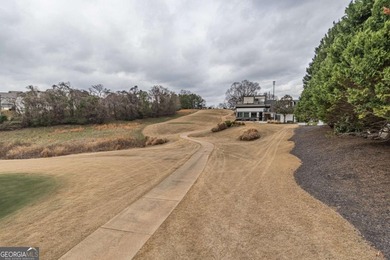 Welcome home to this stunning residence nestled in the desirable on Traditions of Braselton Golf Club in Georgia - for sale on GolfHomes.com, golf home, golf lot