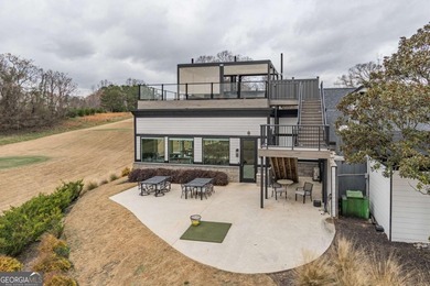 Welcome home to this stunning residence nestled in the desirable on Traditions of Braselton Golf Club in Georgia - for sale on GolfHomes.com, golf home, golf lot