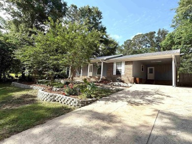 MOTIVATED SELLER! Welcome to this beautifully remodeled home on Lake Forest Yacht and Country Club in Alabama - for sale on GolfHomes.com, golf home, golf lot