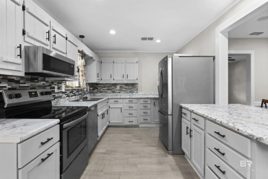 MOTIVATED SELLER! Welcome to this beautifully remodeled home on Lake Forest Yacht and Country Club in Alabama - for sale on GolfHomes.com, golf home, golf lot
