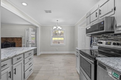 MOTIVATED SELLER! Welcome to this beautifully remodeled home on Lake Forest Yacht and Country Club in Alabama - for sale on GolfHomes.com, golf home, golf lot