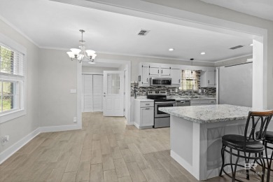 MOTIVATED SELLER! Welcome to this beautifully remodeled home on Lake Forest Yacht and Country Club in Alabama - for sale on GolfHomes.com, golf home, golf lot