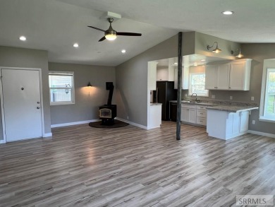 Tastefully updated move in ready 3 bedroom home on a 1 acre lot on Jefferson Hills Golf Course in Idaho - for sale on GolfHomes.com, golf home, golf lot