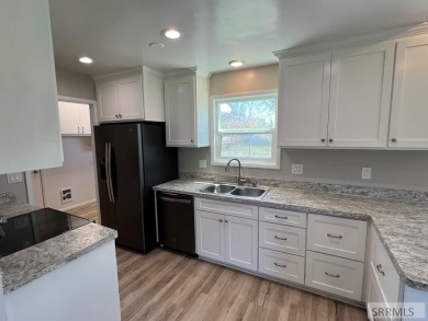 Tastefully updated move in ready 3 bedroom home on a 1 acre lot on Jefferson Hills Golf Course in Idaho - for sale on GolfHomes.com, golf home, golf lot