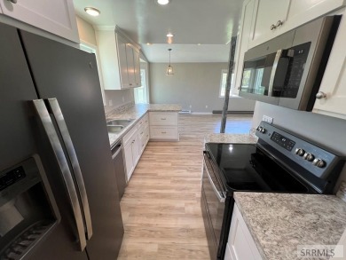 Tastefully updated move in ready 3 bedroom home on a 1 acre lot on Jefferson Hills Golf Course in Idaho - for sale on GolfHomes.com, golf home, golf lot