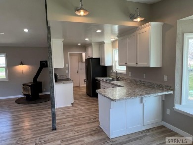 Tastefully updated move in ready 3 bedroom home on a 1 acre lot on Jefferson Hills Golf Course in Idaho - for sale on GolfHomes.com, golf home, golf lot