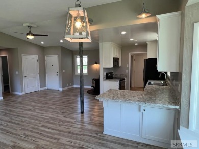 Tastefully updated move in ready 3 bedroom home on a 1 acre lot on Jefferson Hills Golf Course in Idaho - for sale on GolfHomes.com, golf home, golf lot