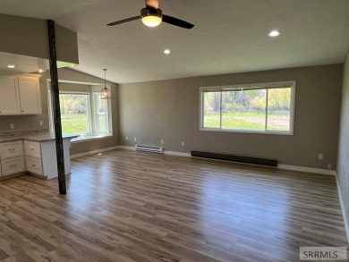 Tastefully updated move in ready 3 bedroom home on a 1 acre lot on Jefferson Hills Golf Course in Idaho - for sale on GolfHomes.com, golf home, golf lot