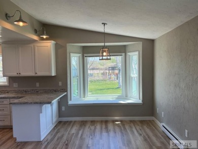 Tastefully updated move in ready 3 bedroom home on a 1 acre lot on Jefferson Hills Golf Course in Idaho - for sale on GolfHomes.com, golf home, golf lot