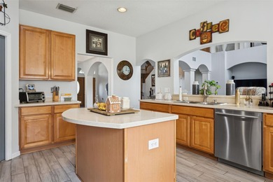 Beautiful well-maintained home on a gorgeous golf course lot in on Heritage Isles Golf and Country Club in Florida - for sale on GolfHomes.com, golf home, golf lot