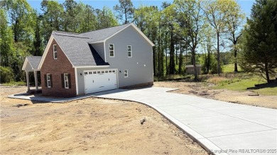 4.99% rate buy down available ~ Kings Grant, Beautiful Golf on Kings Grant Golf and Country Club in North Carolina - for sale on GolfHomes.com, golf home, golf lot