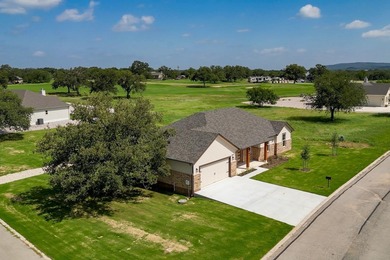 Impressive new construction in the sought-after Lighthouse on Packsaddle Country Club in Texas - for sale on GolfHomes.com, golf home, golf lot