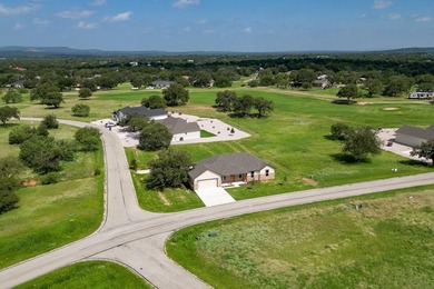 Impressive new construction in the sought-after Lighthouse on Packsaddle Country Club in Texas - for sale on GolfHomes.com, golf home, golf lot