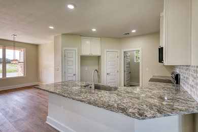 Impressive new construction in the sought-after Lighthouse on Packsaddle Country Club in Texas - for sale on GolfHomes.com, golf home, golf lot