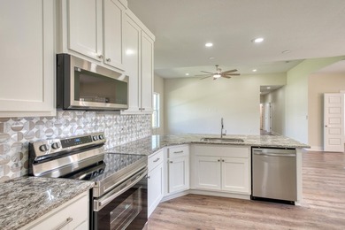 Impressive new construction in the sought-after Lighthouse on Packsaddle Country Club in Texas - for sale on GolfHomes.com, golf home, golf lot