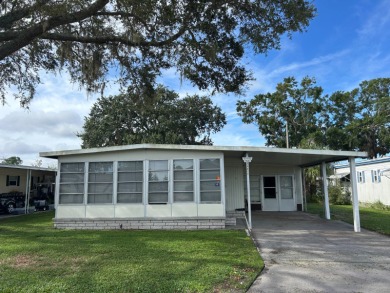 TWO BEDROOM TWO BATH MOSTLY GUTTED HOME AVAILABLE IN ALL AGES on Silver Dollar Golf and Trap Club in Florida - for sale on GolfHomes.com, golf home, golf lot
