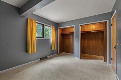 Discover this one-of-a-kind, three-level home nestled on two on Holiday Island Golf Course in Arkansas - for sale on GolfHomes.com, golf home, golf lot