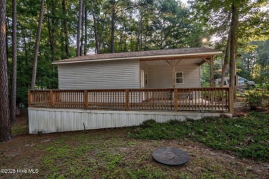 Welcome to Lake Royale! This .28-acre lot features an enclosed on River Golf and Country Club at Lake Royale in North Carolina - for sale on GolfHomes.com, golf home, golf lot