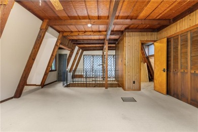 Discover this one-of-a-kind, three-level home nestled on two on Holiday Island Golf Course in Arkansas - for sale on GolfHomes.com, golf home, golf lot