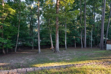 Welcome to Lake Royale! This .28-acre lot features an enclosed on River Golf and Country Club at Lake Royale in North Carolina - for sale on GolfHomes.com, golf home, golf lot