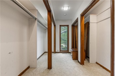 Discover this one-of-a-kind, three-level home nestled on two on Holiday Island Golf Course in Arkansas - for sale on GolfHomes.com, golf home, golf lot