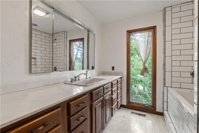 Discover this one-of-a-kind, three-level home nestled on two on Holiday Island Golf Course in Arkansas - for sale on GolfHomes.com, golf home, golf lot
