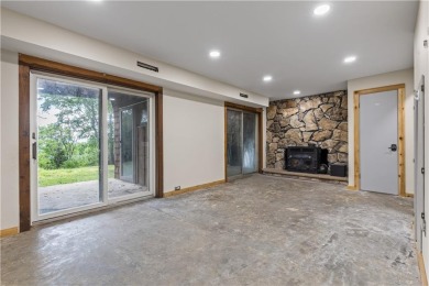 Discover this one-of-a-kind, three-level home nestled on two on Holiday Island Golf Course in Arkansas - for sale on GolfHomes.com, golf home, golf lot