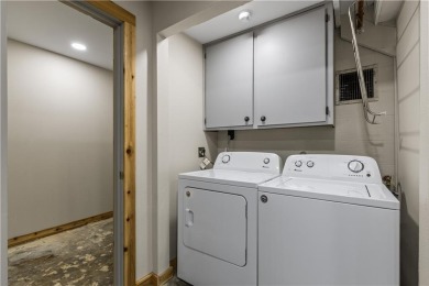 Discover this one-of-a-kind, three-level home nestled on two on Holiday Island Golf Course in Arkansas - for sale on GolfHomes.com, golf home, golf lot