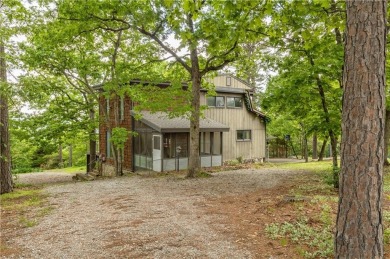 Discover this one-of-a-kind, three-level home nestled on two on Holiday Island Golf Course in Arkansas - for sale on GolfHomes.com, golf home, golf lot