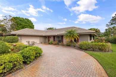 A classic home is nestled in the prestigious Bent Pine community on Bent Pine Golf Club in Florida - for sale on GolfHomes.com, golf home, golf lot
