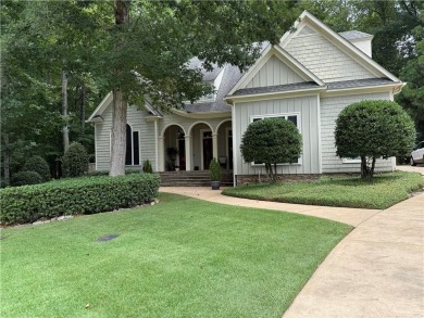 Nestled on a serene, wooded lot with immaculate landscaping and on Moores Mill Golf Club in Alabama - for sale on GolfHomes.com, golf home, golf lot